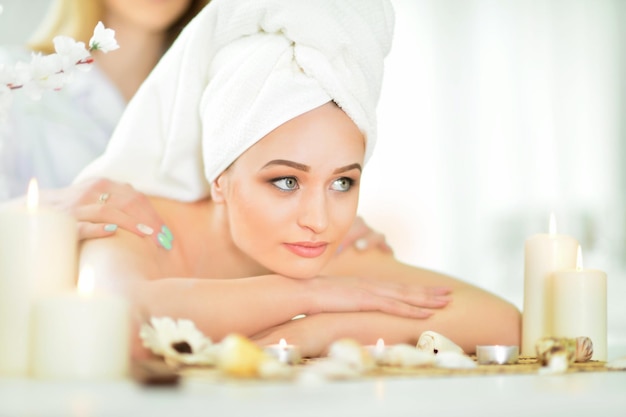 Girl lying down on a massage bed