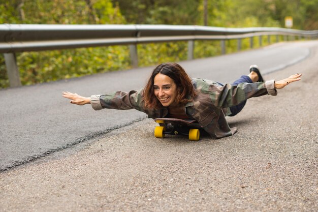 Girl lying on skateboard