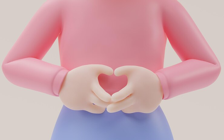 Photo 소녀는 노란색 배경 위에 격리된 사랑처럼 몸짓을 합니다