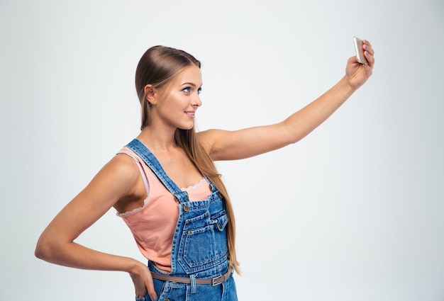 Girl making selfie photo on smartphone