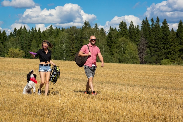 Girl and the man with the dog