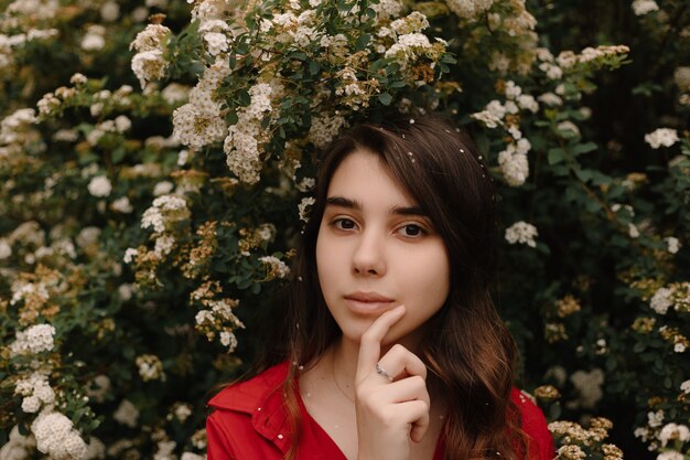 girl in a medical mask with flowers