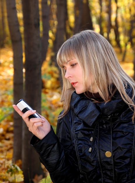 Girl messaging with phone