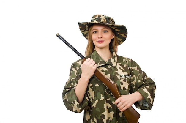 Girl in military uniform holding the gun isolated on white