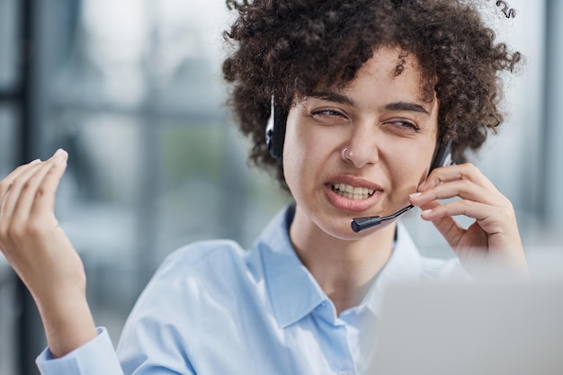 Girl in a modern office working in a call center smiling