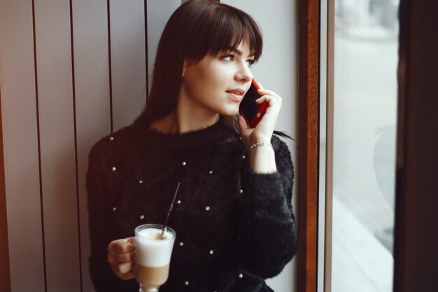 Girl near window