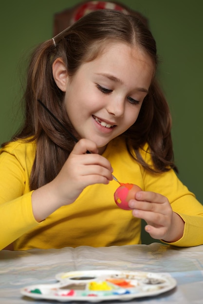 Girl painted easter eggs