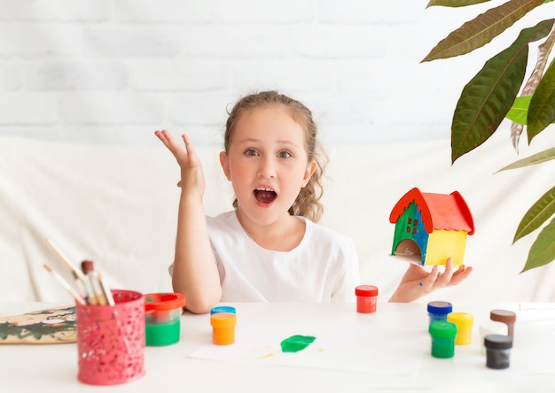 girl painted the house of her dreams with paints