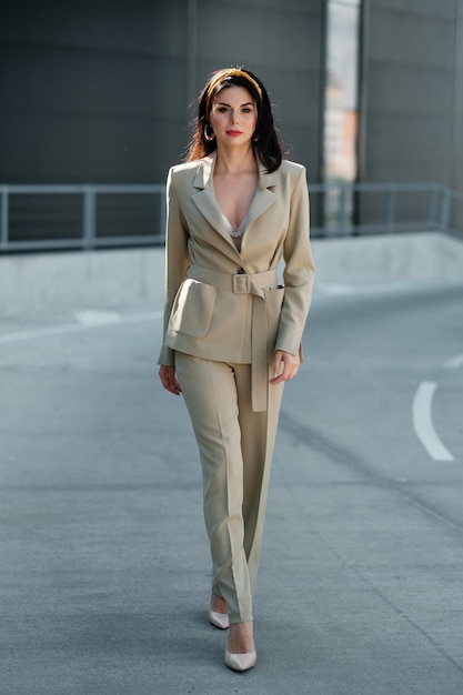 Girl in pantsuit on the street Business woman portrait