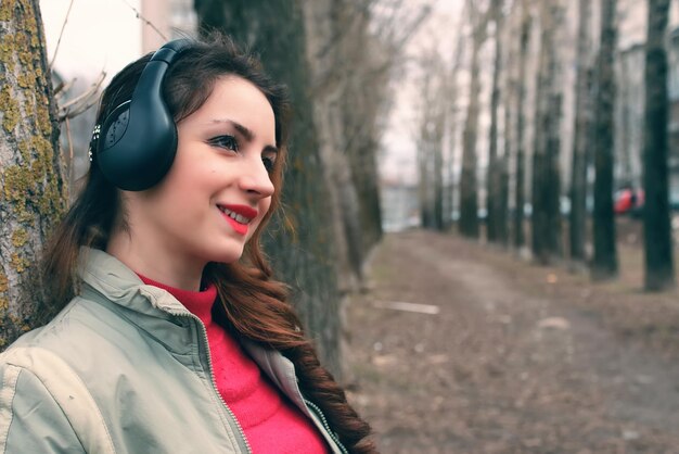 Girl in park with headphone