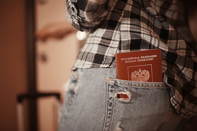 girl passport travel, woman with a passport in her pocket, concept travel