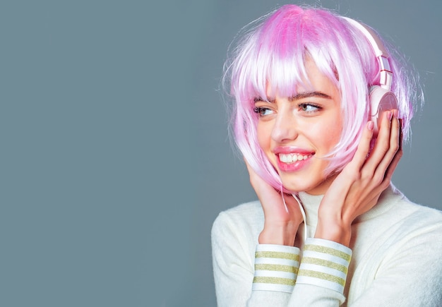 Girl in pink wig with headset