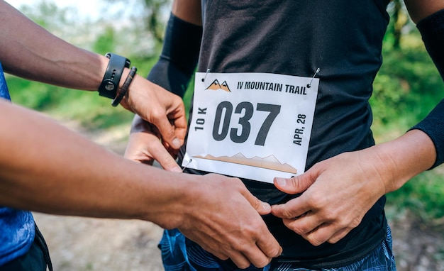 Girl placing the race number