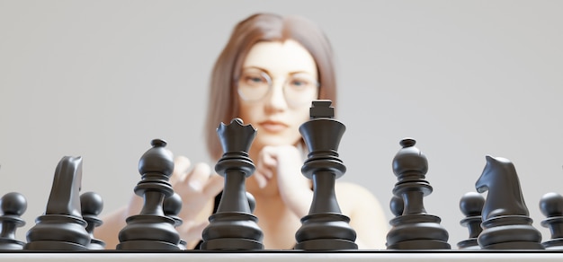 girl playing chess on blurred with black pieces in focus