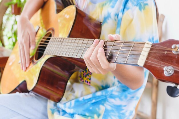 Girl playing classical guitar