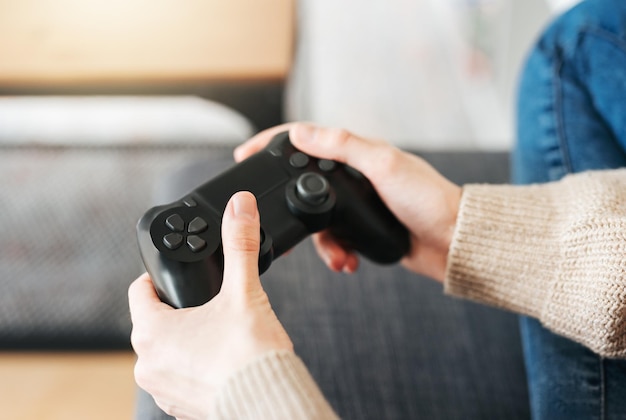 Photo girl playing on games console