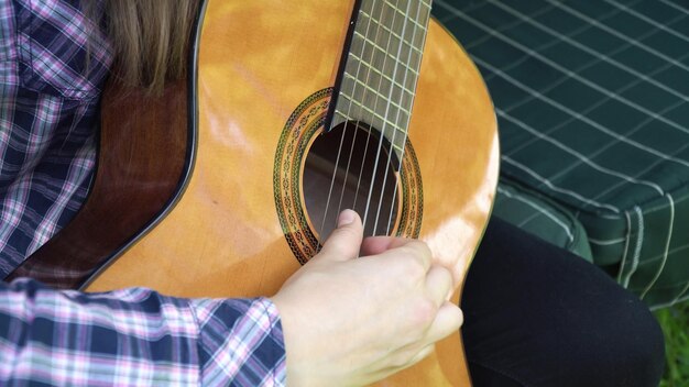 Girl playing the guitar