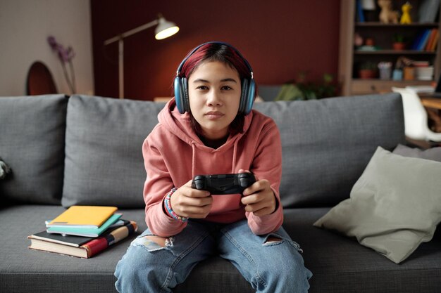 Girl playing new video game at leisure