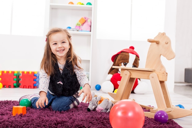 Girl playing in the room