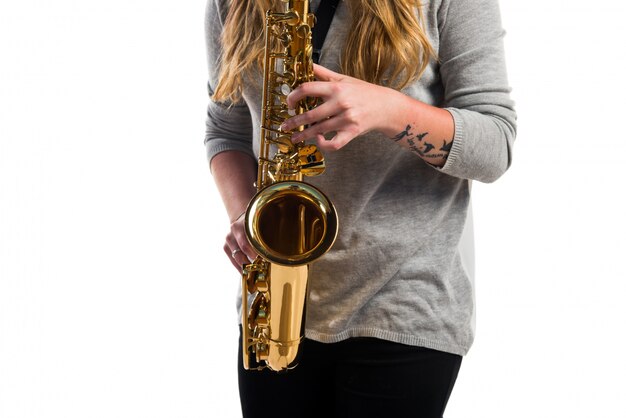 Girl playing the saxophone