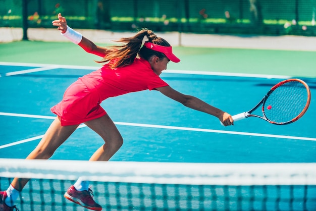 Girl playing tennis