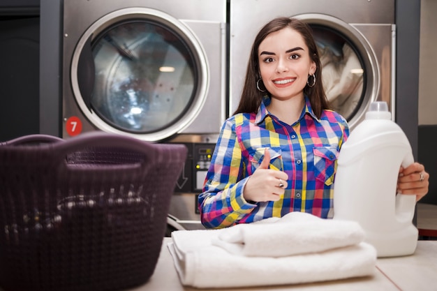 Girl pleased with the result of washing.