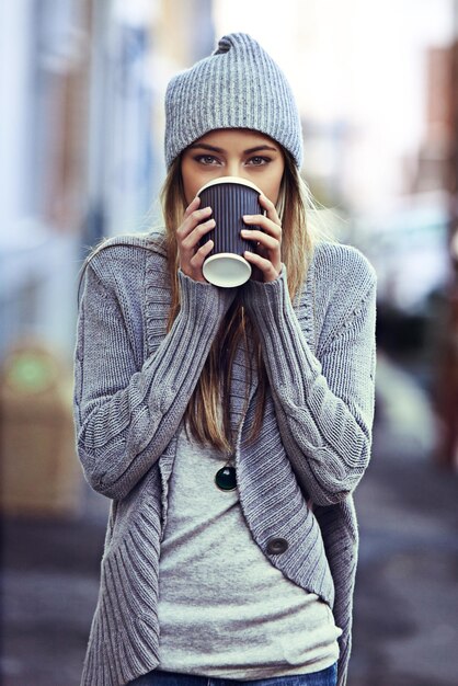 girl portrait and drinking coffee on walk in city travel and hot beverage for peace in autumn female person urban town and espresso to relax on holiday in new york plastic cup and cappuccino