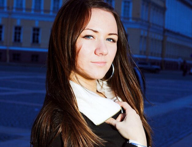 Girl posing in evening city