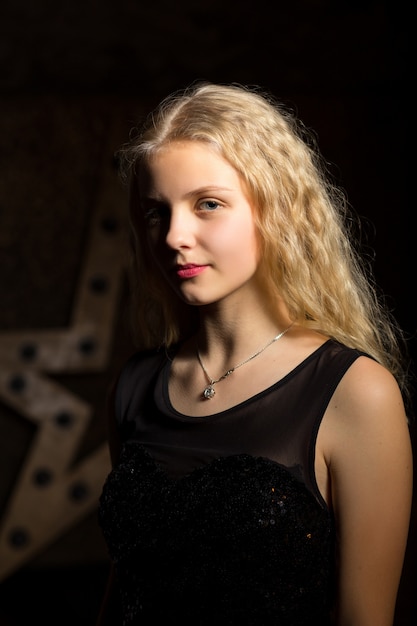 The girl posing in the studio