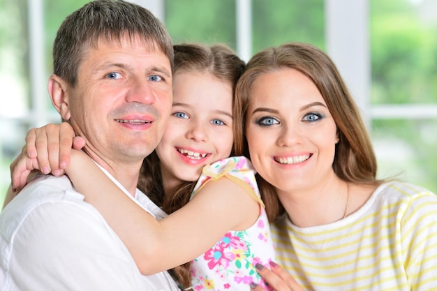 Girl posing with her parents