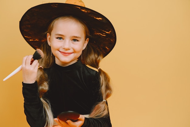 Girl preparing for haloween party