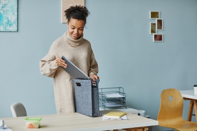 Girl preparing for work at office