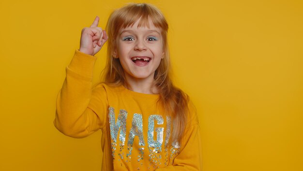 Girl raises finger came up with creative plan feels excited with good idea inspiration motivation