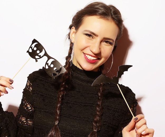 Girl ready for party over white background halloween concept