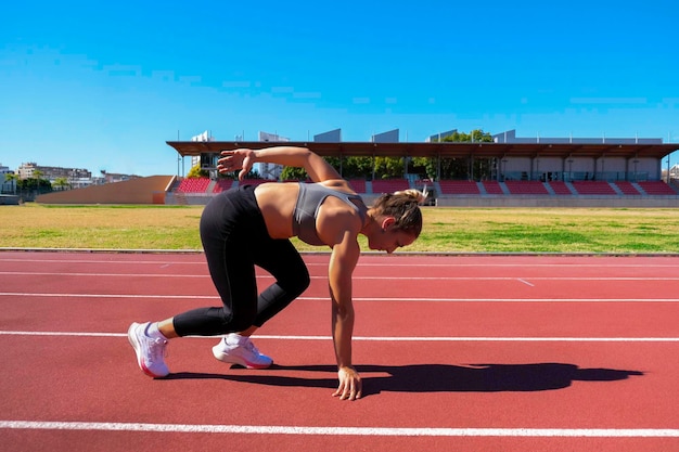 Photo girl ready to start track race