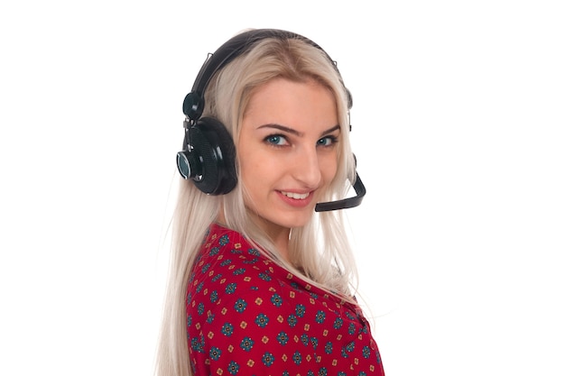 Girl in a red shirt with headphones