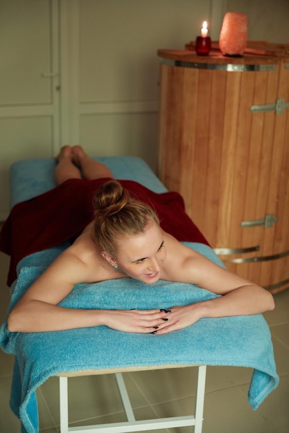 Girl relaxing in a spa salon before massage