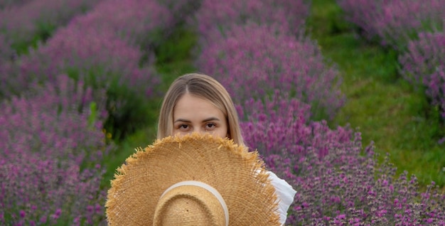 the girl rests in a lavender field Selective focus nature