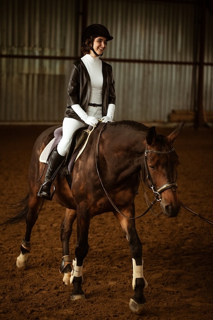 Girl riding a horse rider on a horse gallop equestrian sport concept horse riding training active li...