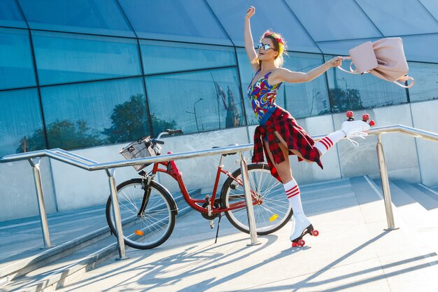 Girl on the roller-skate in the city