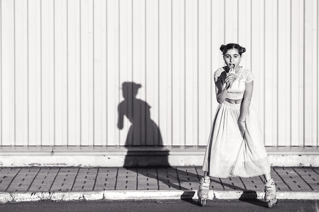 Girl on rollers with ice cream