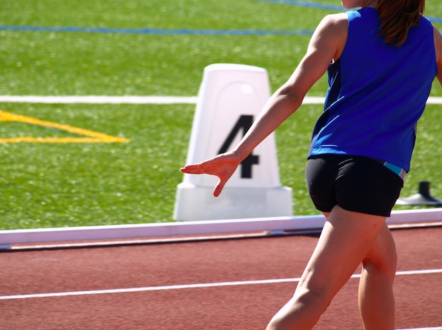 Girl running track and field