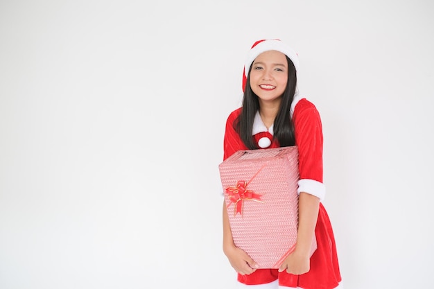 The girl in santa claus dress on christmas party