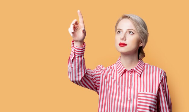 Girl in a shirt with red stripes  