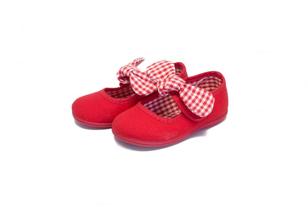 Девушка обуви красный на белом фоне