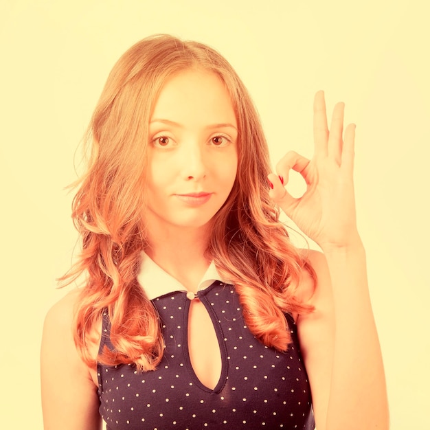 Girl showing ok sign