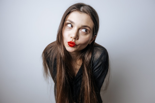 Photo girl shows off her red lips