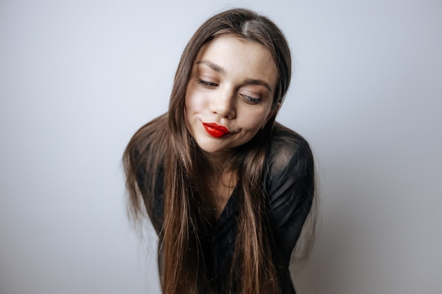 Girl shows off her red lips