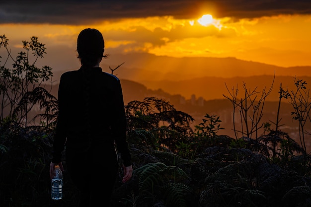 Girl silhouette at sunset