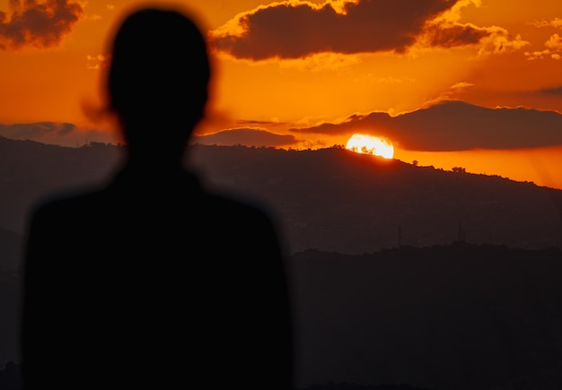 Girl silhouette at sunset